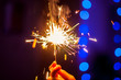 © Андрей Глущенко - burning Sparkler holds in his hand