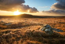 Brown Willy Tor On Bodmin Moor At Sunrise With Beautiful Cloudy Golden Sky, Cornwall, Uk