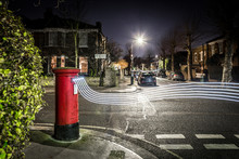 Postbox And Light Trails In London Suburb