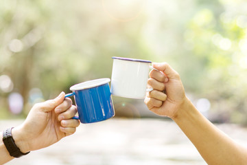 Clink glasses a cup of coffee