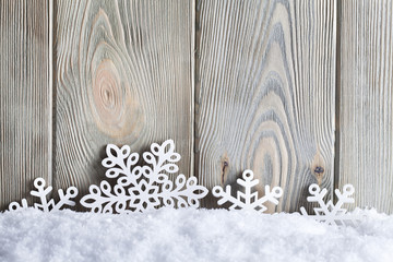 Sticker - Christmas background - snowflakes on snow and wooden wall