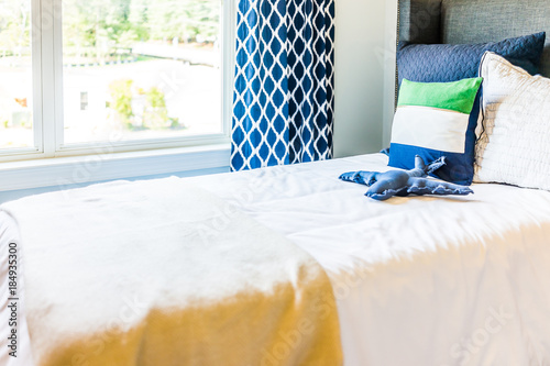 Closeup Of New Bed Comforter With Decorative Airplane
