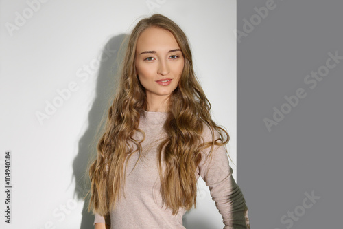 Beautiful Girl With Long Curly Blonde Hair Natural Makeup And