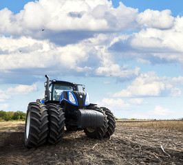 Poster - The tractor is working on the farm