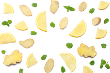 Wall Mural - healthy background. sliced ginger and lemon isolated on white background top view