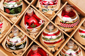 Big Set of Luxury Winterberry Glass Baubles. Retro styled image of vintage Christmas decoration in a box. Christmas holidays composition.