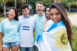© Daniel Ernst - Attraktive Argentinierin mit Fahne und anderen Fans
