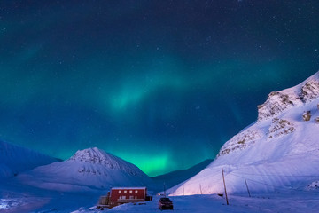 Wall Mural - the polar arctic northern lights aurora borealis sky star in norway svalbard in longyearbyen city th