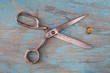 Retro sewing accessories on blue wooden background