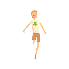 Poster - Guy jumping with joyful face expression. Man in brown shorts and t-shirt with four-leaf clover print. Cartoon male character with good luck. Flat vector illustration