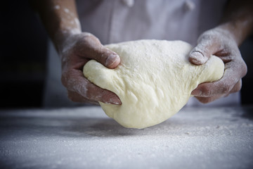 Wall Mural - Kneading bread dough