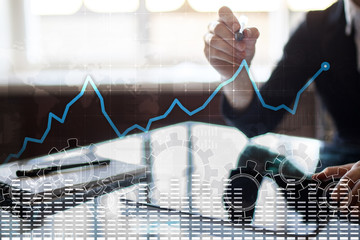 Data analysis graph on virtual screen. Business finance and technology concept.