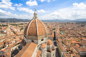 Wall Mural - Panorama view on the dome of Santa Maria del Fiore church and old town in Florence, Italy