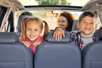 Sticker - Cute children with parents in car