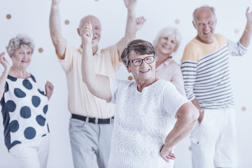 Wall Mural - Happy senior woman celebrating birthday