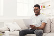 © Prostock-studio - Surprised young businessman reading paperwork at home