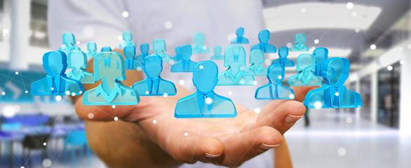 Aufkleber - Businessman holding 3D rendering group of blue people