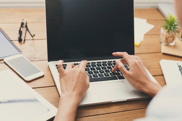 Aufkleber - Closeup of the hands working on laptop with blank screen