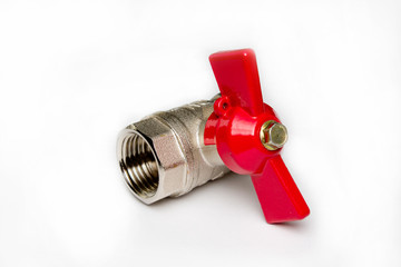 water metal valve with a red handle