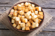 Crispy croutons in bowl