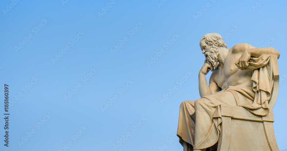 Ancient marble statue of the great Greek philosopher Socrates on background the blue sky.  - obrazy, fototapety, plakaty 