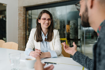 Wall Mural - Explaining job duties to potential candidate for a job post