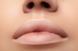 © marinafrost - Moisturizing lip, lipstick. Close-up beautiful lips. Full lips with natural makeup. Filler Injections, Plastic Surgery