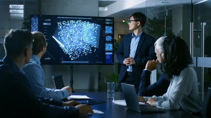 Aufkleber - In the Conference Room Chief Engineer Presents to a Board of Scientists New Revolutionary Approach for Developing Artificial Intelligence and Neural Networks. Wall TV Shows Their Achievements.