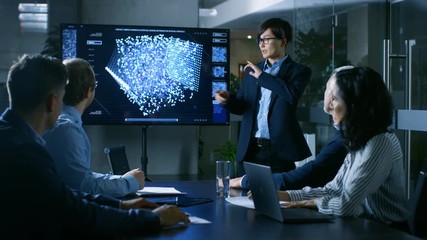 Aufkleber - In the Conference Room Chief Engineer Presents to a Board of Scientists New Revolutionary Approach for Developing Artificial Intelligence and Neural Networks. Wall TV Shows Their Achievements. 