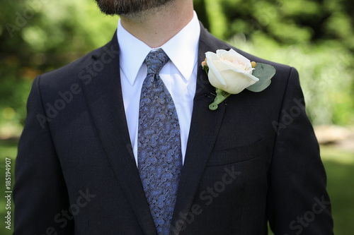 black suit blue tie wedding