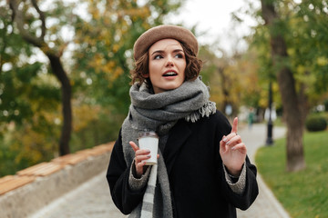 Sticker - Portrait of a pretty girl dressed in autumn clothes