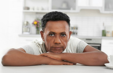 Poster - Portrait of mature African-American man at home