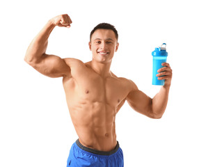 Wall Mural - Sporty young man with protein shake on white background