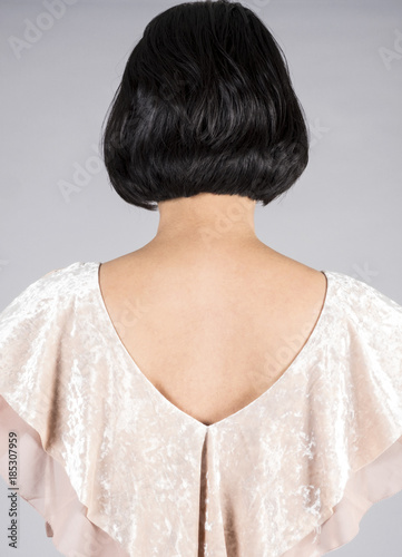 Back View Of A Woman With Shiny Short Black Hair Buy This Stock