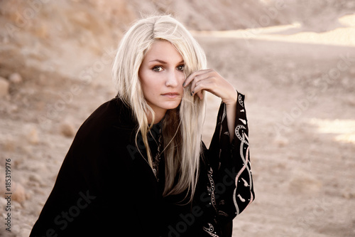 Woman With Blond Hair And Beautiful Deep Eyes Full Of Emotions In