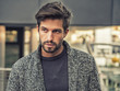 © theartofphoto - One handsome young man in urban setting in European city, standing