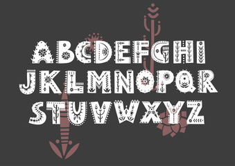 Aufkleber - Vector patterned alphabet decorated with folk ornaments based on desert motifs.  Display uppercase font on a black background.