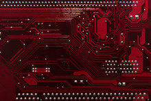 Circuit Board. Electronic Computer Hardware Technology. Motherboard Digital Chip. Tech Science Background. Integrated Communication Processor. Information Engineering Component. Red Color.