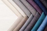 Bright collection of gunny textile samples. Fabric texture background.