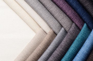 bright collection of gunny textile samples. fabric texture background.