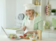 © aletia2011 - Senior chef woman portrait at kitchen