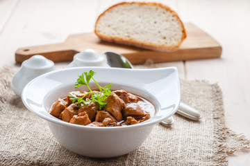 Wall Mural - Goulash soup with pork and mushrooms.