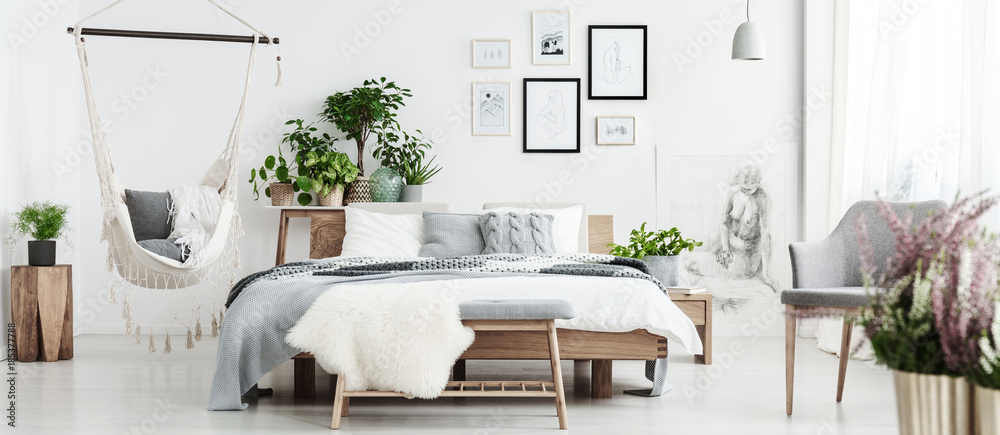 Spacious natural bedroom with hammock - obrazy, fototapety, plakaty 