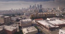 Aerial View Of Arts District With Downtown Los Angeles Skyline In Background