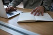 © wavebreak3 - Male executive working at desk with laptop