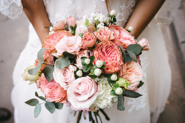 bride with bouquet, closeup
