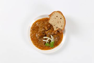 Sticker - beef goulash with bread