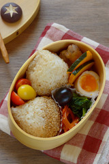 Bento is a single-portion take-out or home-packed meal common in Japanese cuisine. A traditional bent version holds rice or noodles, fish or meat, with pickled and cooked vegetables, in a box.