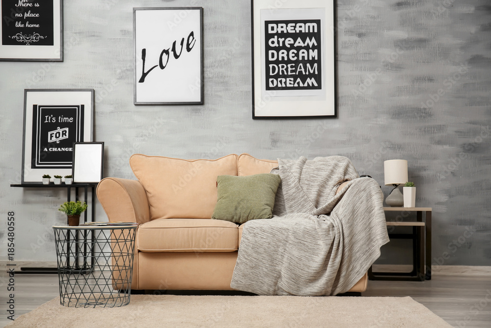 Interior of living room with comfortable sofa