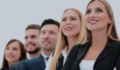 Team of successful and confident people posing on a white backgr